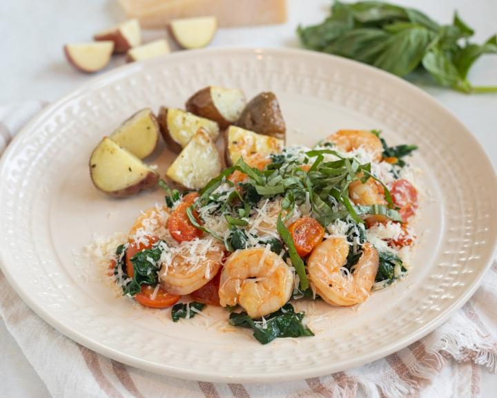 Shrimp Sauté with Spinach, Grape Tomatoes, and Roasted Red Potatoes